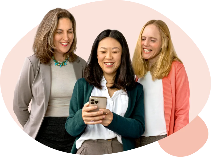 Coral_about-us-sm Women sharing phone