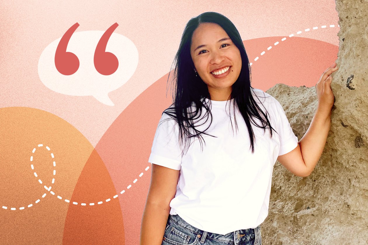 A smiling woman leaning against a stone wall, overlaid on an abstract coral and peach background with a large quotation mark icon for a Coral member testimonial.
